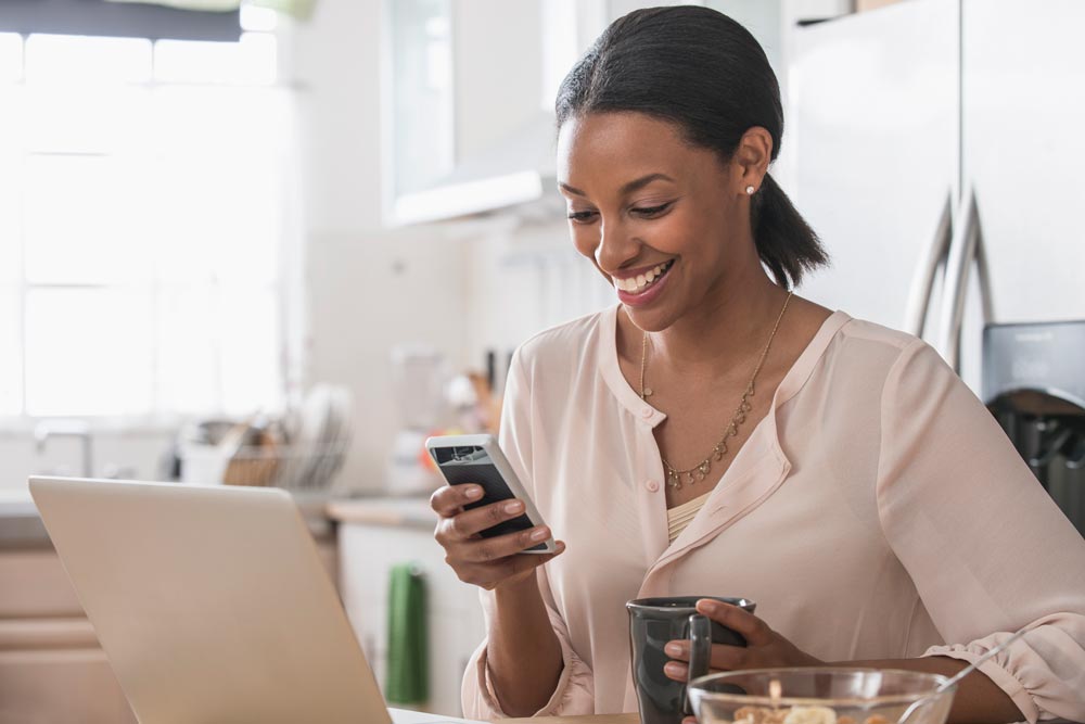 Woman searching for an event on mobile phone