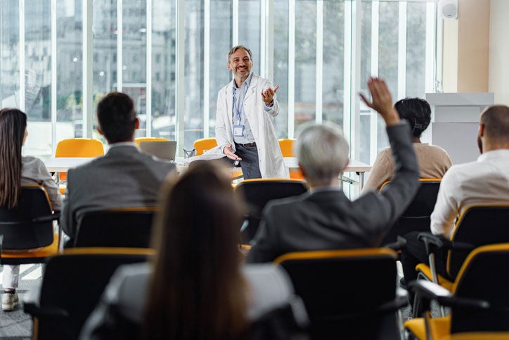 Doctor presenting to audience