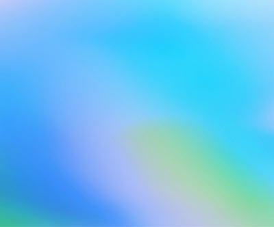 Soft blue and green gradient background with subtle blur